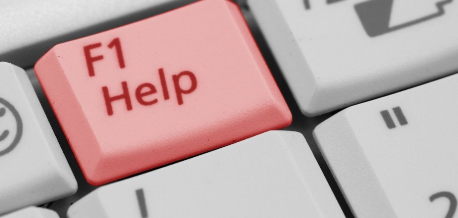 Rote Taste auf der Tastatur auf der Help steht.